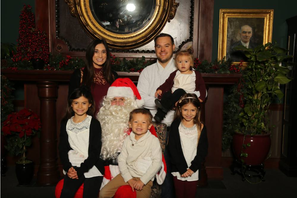 Family of six and Santa Claus